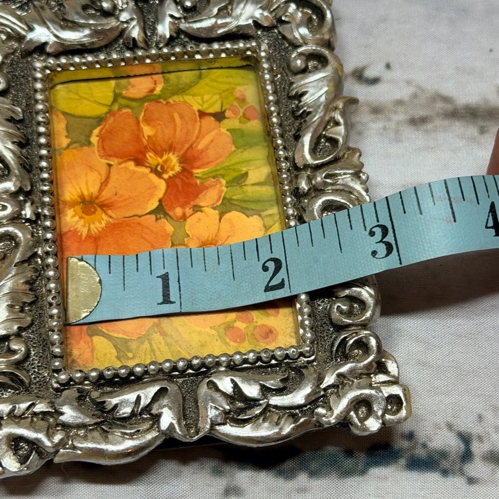 Ornate Silver Picture Frame with scrolling Art cherub detail 3x5”‎